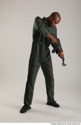 Man Adult Average Black Fighting with gun Standing poses Army